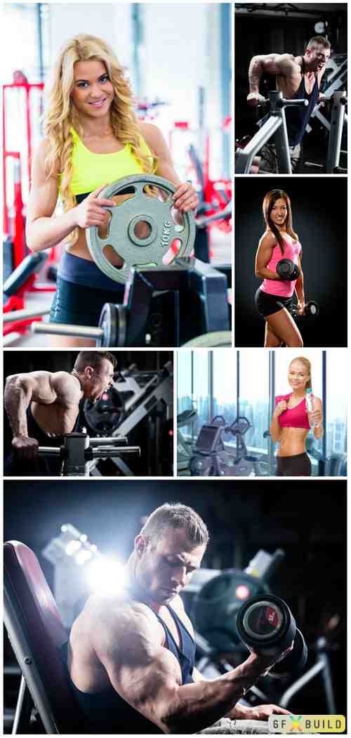 Men and women in gym stock photo